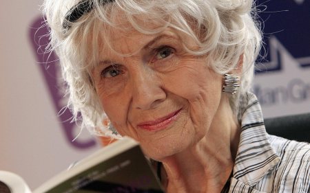 Canadian author Alice Munro holds one of